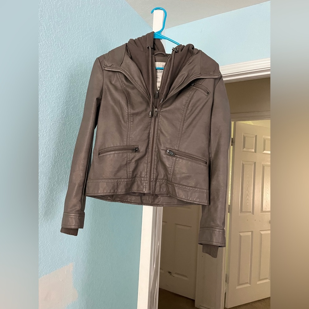 Leather jacket with hoodie.